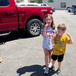 Children learn about the work of a firefighter