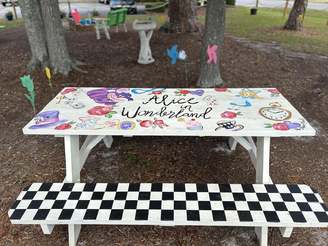 Storybook park, decorated picnic tables