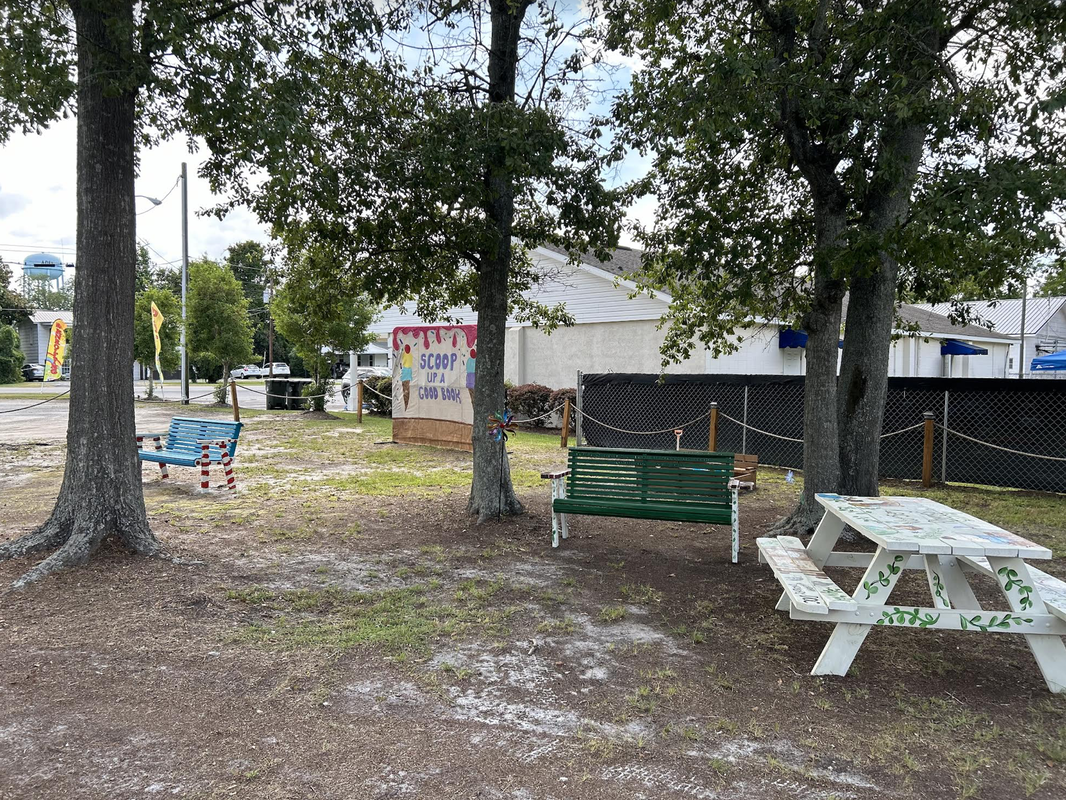 Storybook park, decorated picnic tables